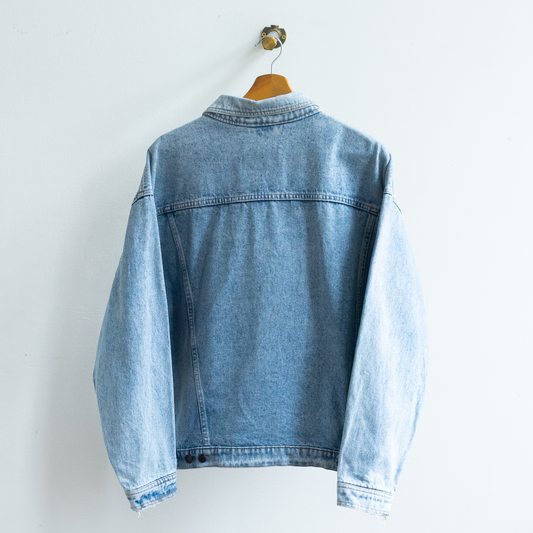 A light wash vintage 90s blue denim jacket