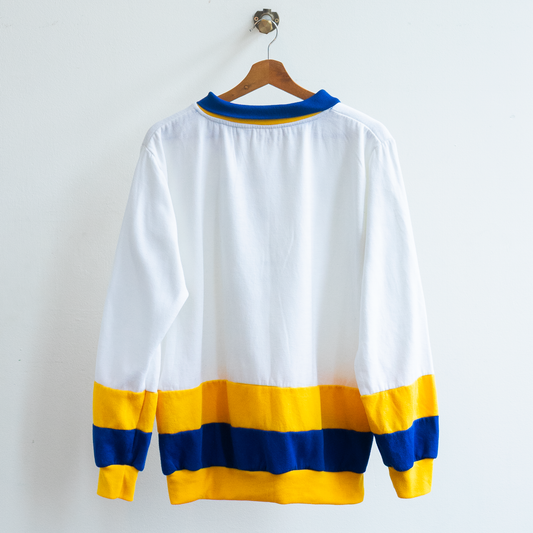 Vintage St. John's Bay Colorado sweatshirt showing the white, blue and yellow color block design with blue collar on the back.
