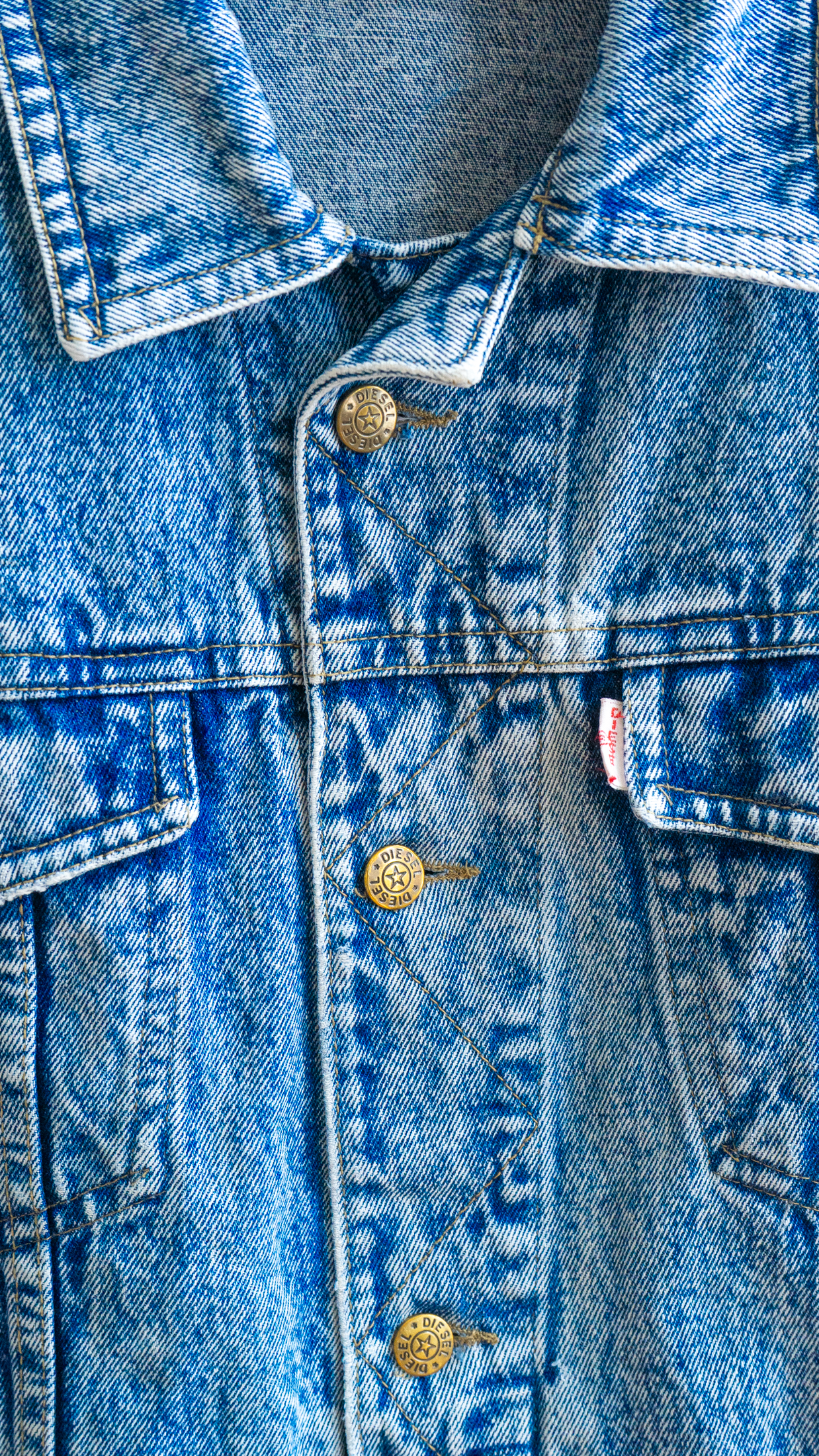 close-up of vintage diesel jeans jacket 1990 metal diesel buttons diesel logo fresh vintage