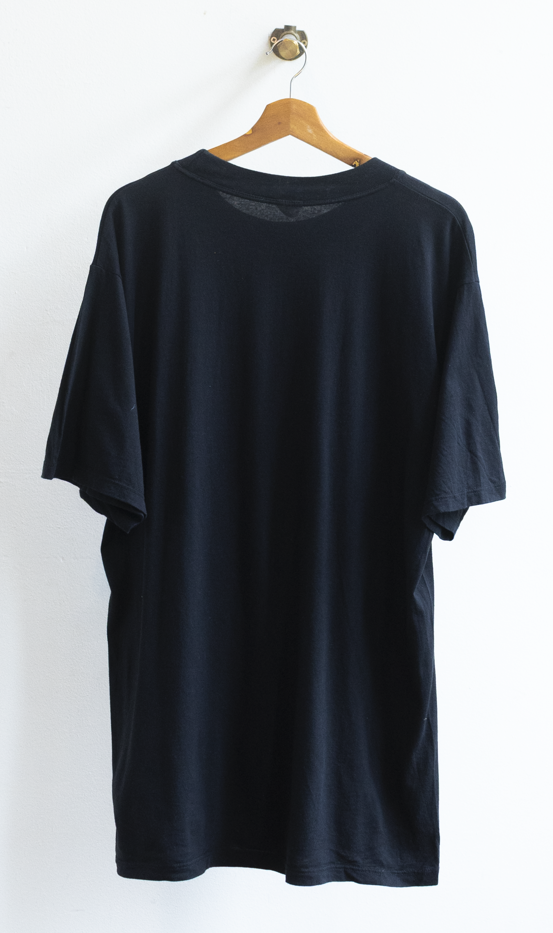 back of 80s Oversized black graphic vintage T-Shirt Dress.