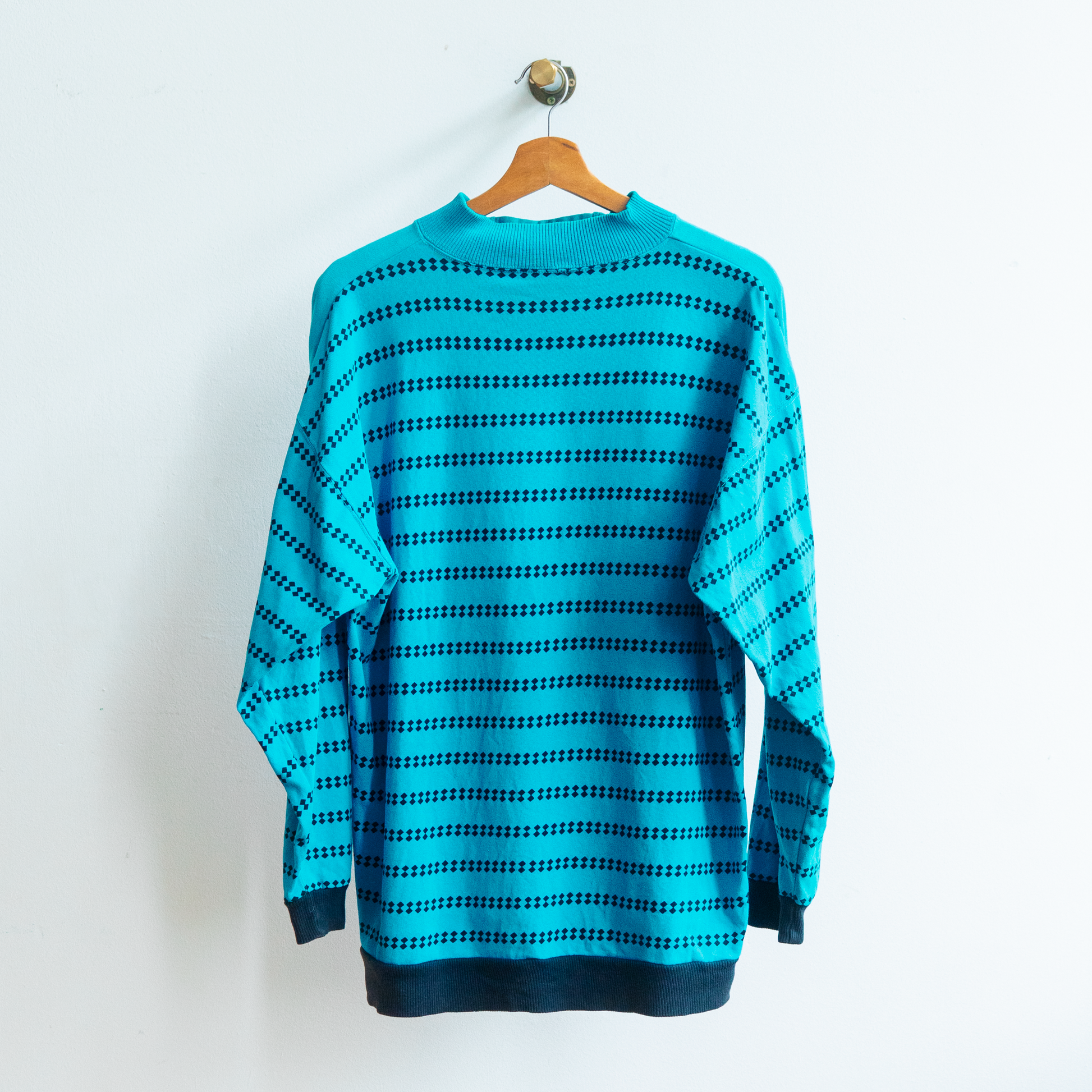 back of blue 80s turtleneck sweater with ribbed collar fresh vintage
