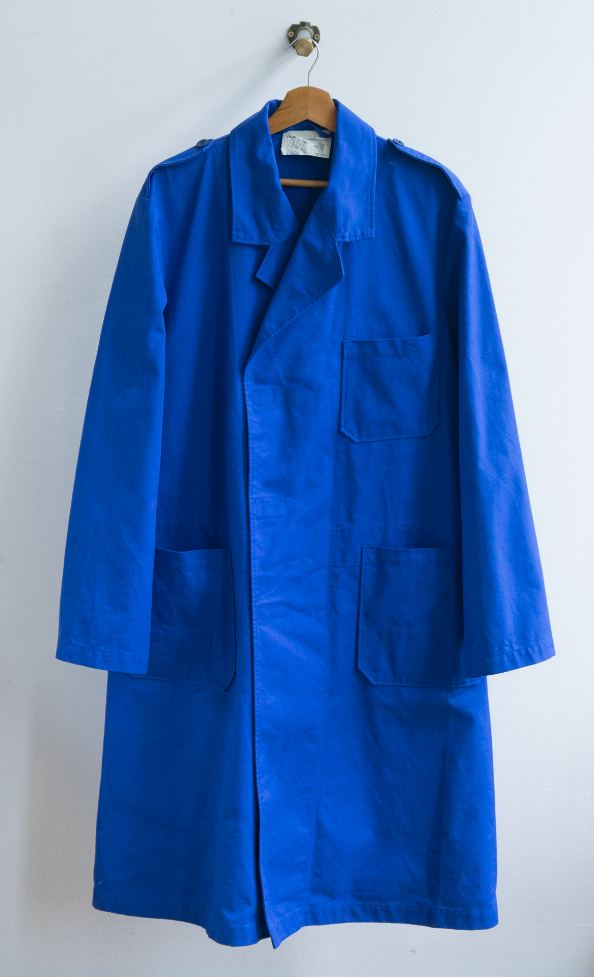 lange blauwe vintage werkjas