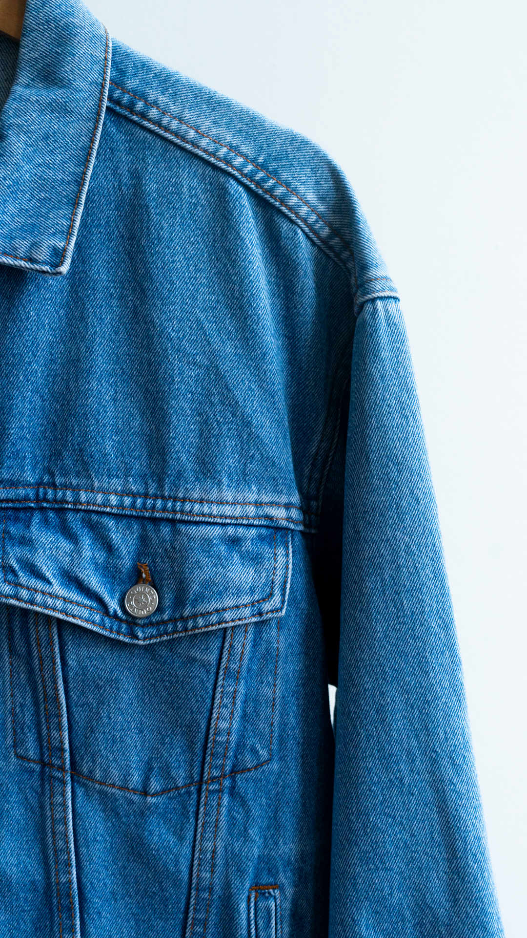 detail secondhand light blue jeans jacket