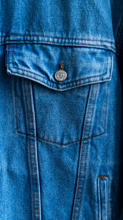 detail pocket of a secondhand jeans jacket