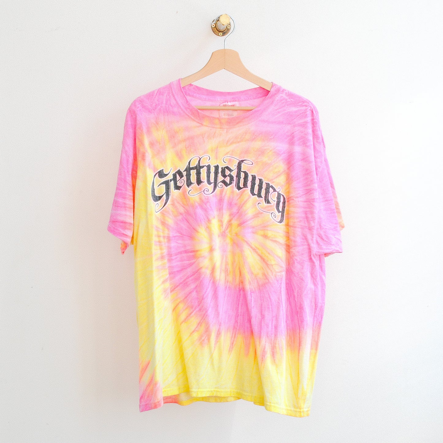 pink and yellow tie dye tshirt with gettysburg in black letters