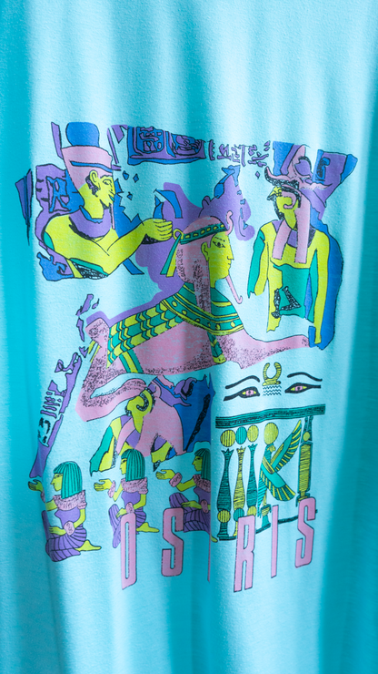 image of egyptian figures on light blue oversized vintage t-shirt