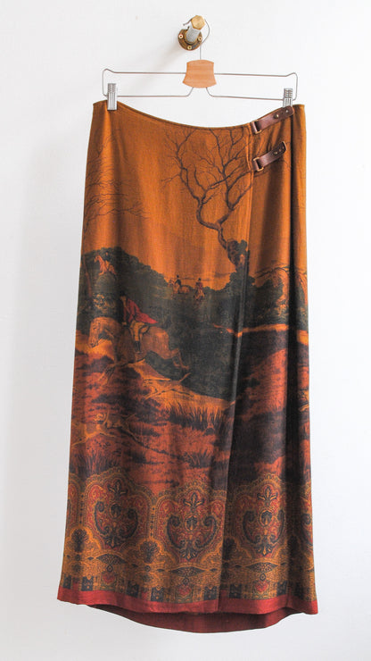 lange bruine vintage yves saint laurent rok met kleine leren bruinen gespen bovenaan en lopende paarden met jockeys in de natuur afgebeeld