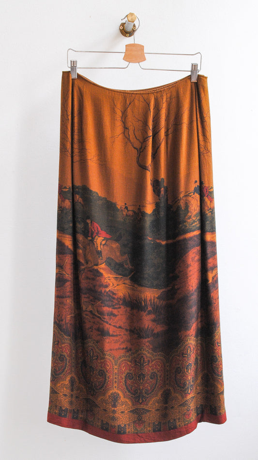 back of long brown yves saint laurent vintage skirt with horseback riding imagery in nature